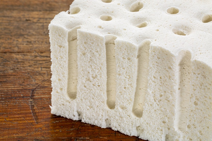 Freshly tapped natural latex dripping from a rubber tree into a collection cup – the first step in making an organic, GOLS-certified mattress.