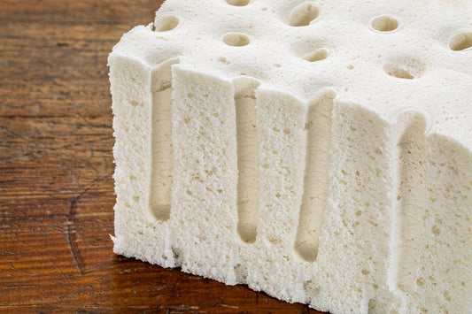 Freshly tapped natural latex dripping from a rubber tree into a collection cup – the first step in making an organic, GOLS-certified mattress.